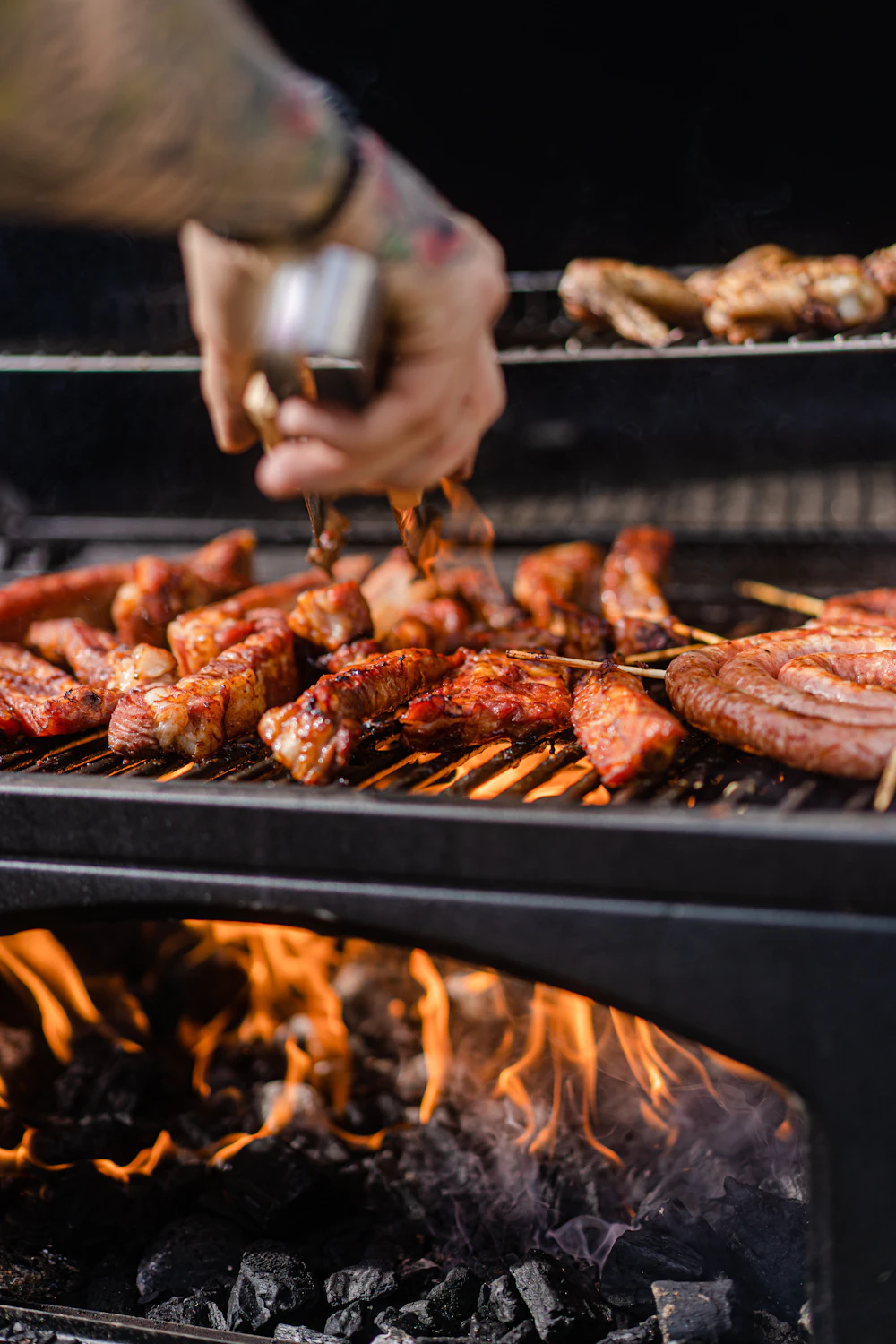 Hog roast cooking over open flame